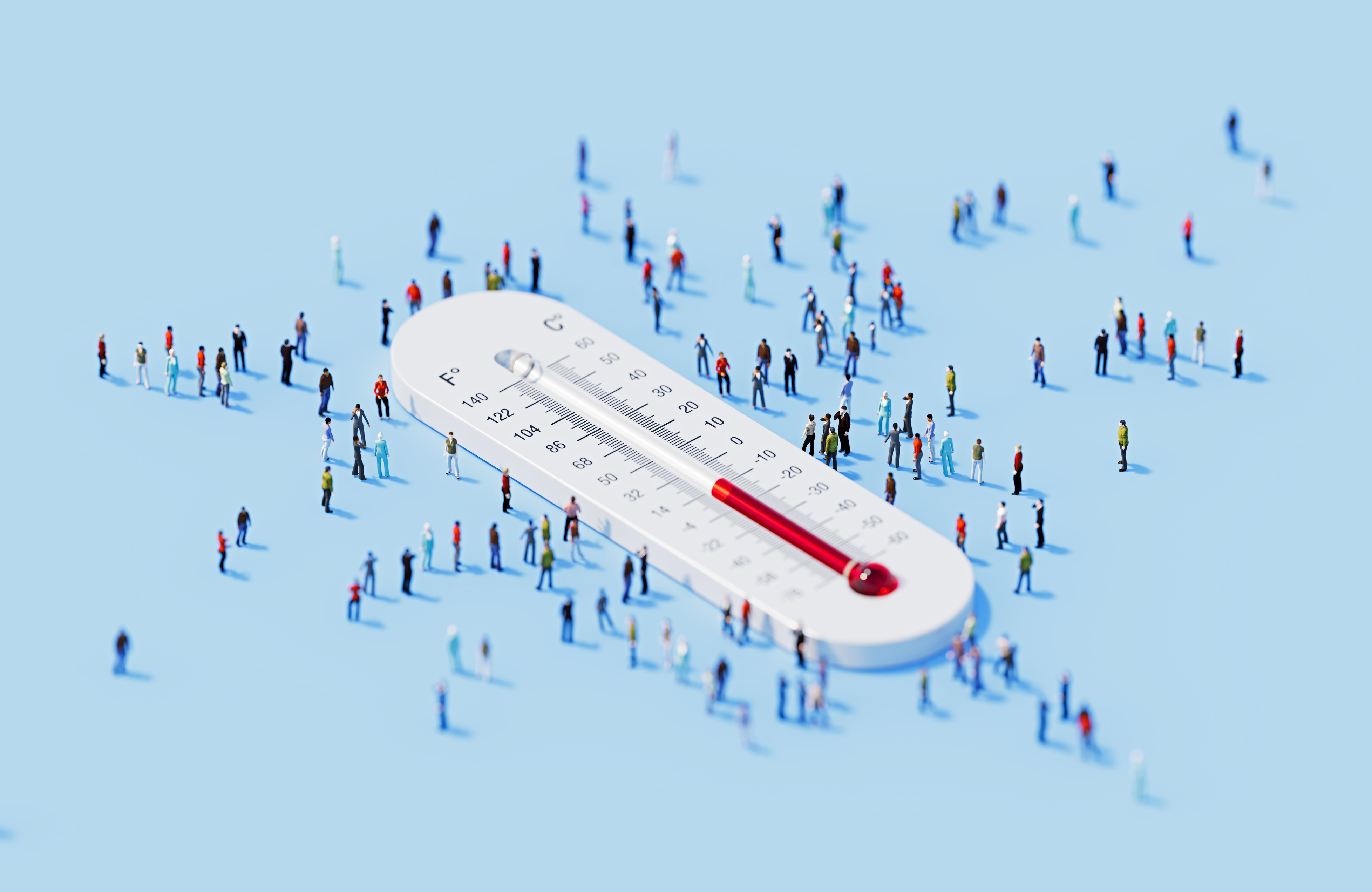 A large thermometer surrounded by small figures of people